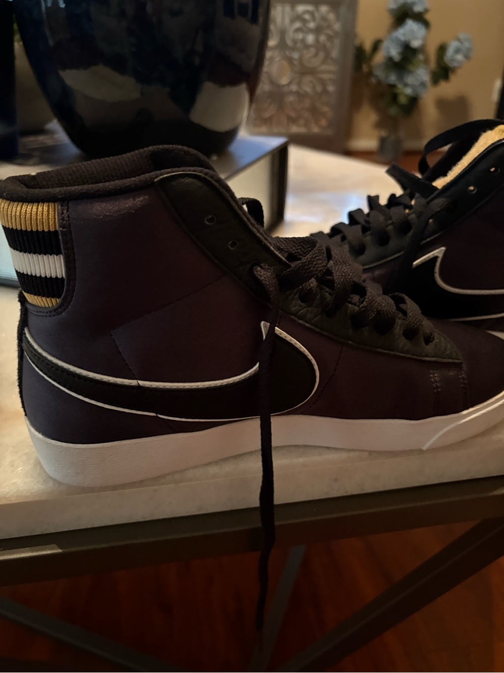 Nike Women's Blaze Black and White Mid-Top Sneaker with Gold Accents
